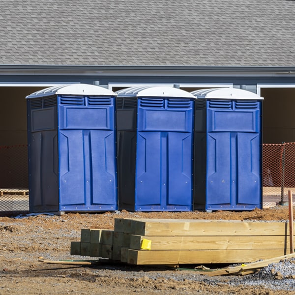 what is the cost difference between standard and deluxe portable toilet rentals in Randolph